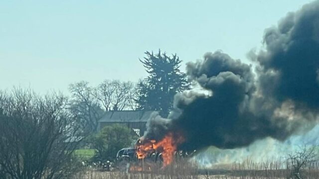 Watch: UK firefighters tackle tractor fire after flames destroy crop fields