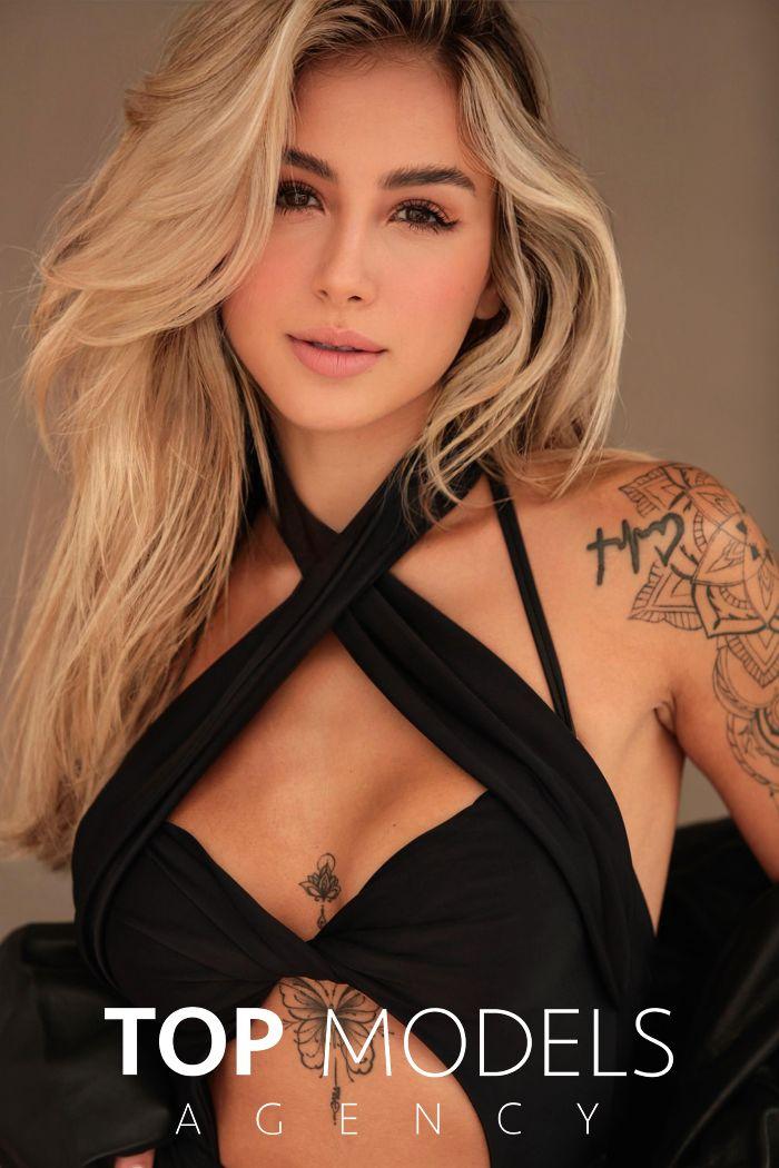 Lia, escort in London from Top Models Agency.