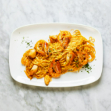 Meal card cover for: Tagliolini Gamberoni & Zucchini
