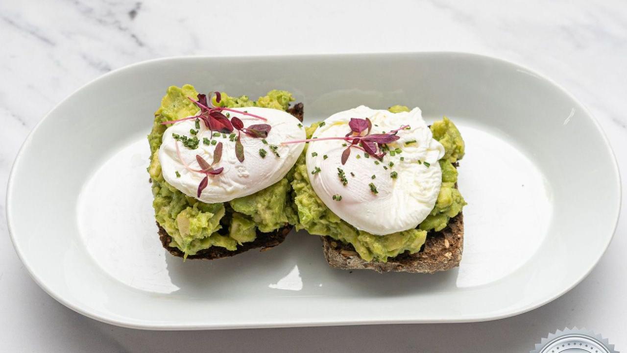 Meal card cover for: Two Poached Eggs on Avocado on toasted bread