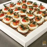 Meal card cover for: Goat Cheese Bruschetta With Red and Yellow Pepper Salata