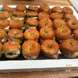 Meal card cover for: Mini Focaccia with Pistachio Mortadella and Truffled Burrata