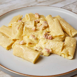 Meal card cover for: Rigatoni with NDUJA( SPICY SALAMI) AND ITALIAN SAUSAGES