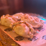 Meal card cover for: Chicken Empanada