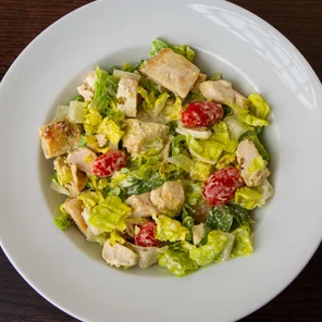 Meal card cover for: Chicken Tikka Ceasar Salad (M)