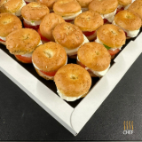 Meal card cover for: Mini Focaccia with Basil Pesto marinated Mozzarella and Tomato