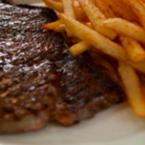 Meal card cover for: Pan Grilled Sirloin Steak served with Chips and Salad