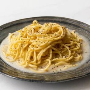 Meal card cover for: Cacio e Pepe Tagliolini