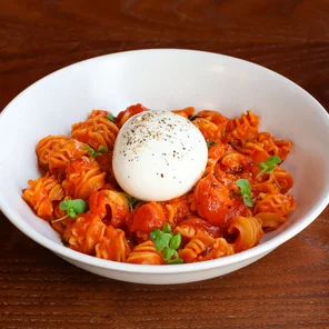 Meal card cover for: Homemade Tomato Sauce (Radiatori) with a 100g ball of Burrata Pugliese D.O.P.