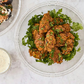 Meal card cover for: Platter of sweet potato and quinoa fritters with soy cream