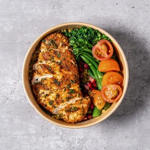 Meal card cover for: Cajun Spiced free range chicken breast with tenderstem broccoli, flavoured couscous, cherry tomatoes & pomegranate 🌶️