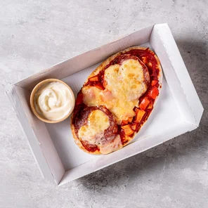 Meal card cover for: Pitta pizza topped with red pepper, salami, cheese & herbs with a dip of your choice.