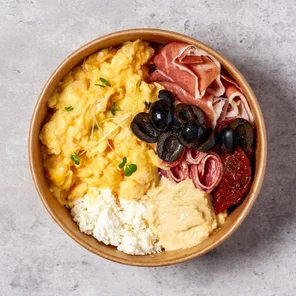 Meal card cover for: Free range Scrambled Egg Protein Pot with Serrano Ham, Salami, Black Olives, Sundried Tomatoes, Greek Cheese & Hummus 🫒