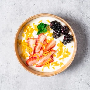 Meal card cover for: High protein Greek yogurt with strawberries, blackberries, orange zest and garnished with mint leaves.