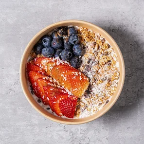 Meal card cover for: High protein Greek yogurt with vegan chocolate protein, granola, cocao nibs, berries, cinnamon & coconut.