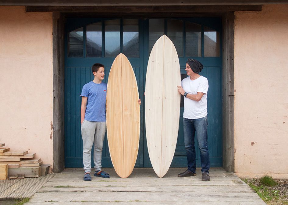 Otter wooden surfboard workshop blue doors