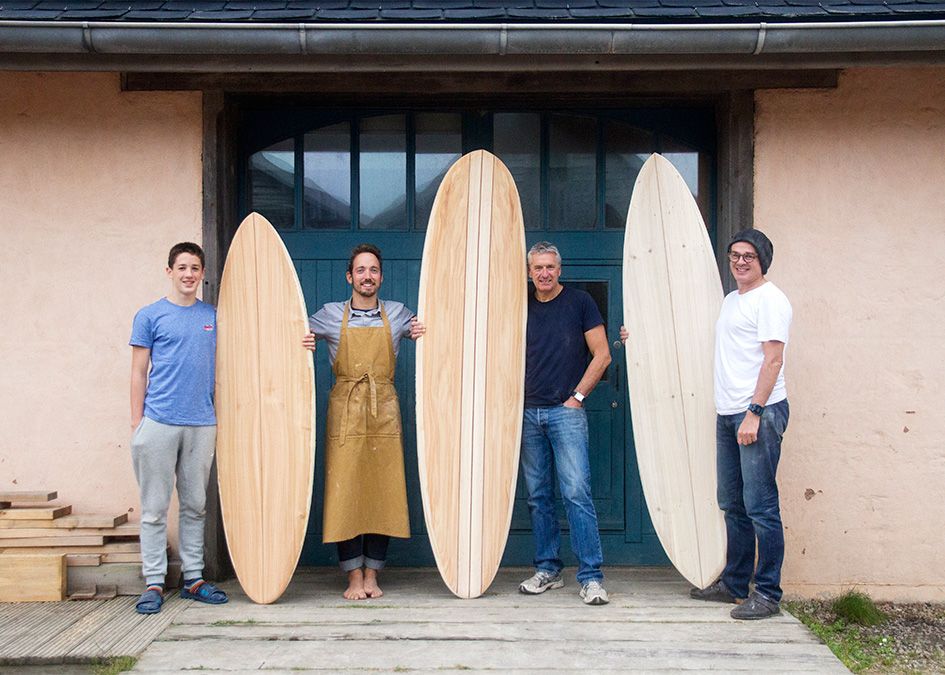 Otter wooden surfboard workshop blue doors
