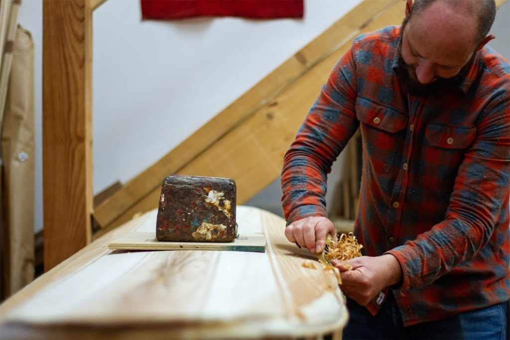Otter workshop wooden surfboard planing