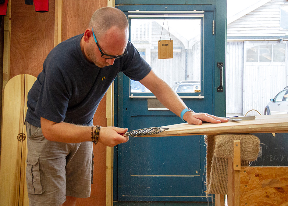 Otter wooden surfboard making workshop blue doors henry and matt portrait cornwall matt rasping