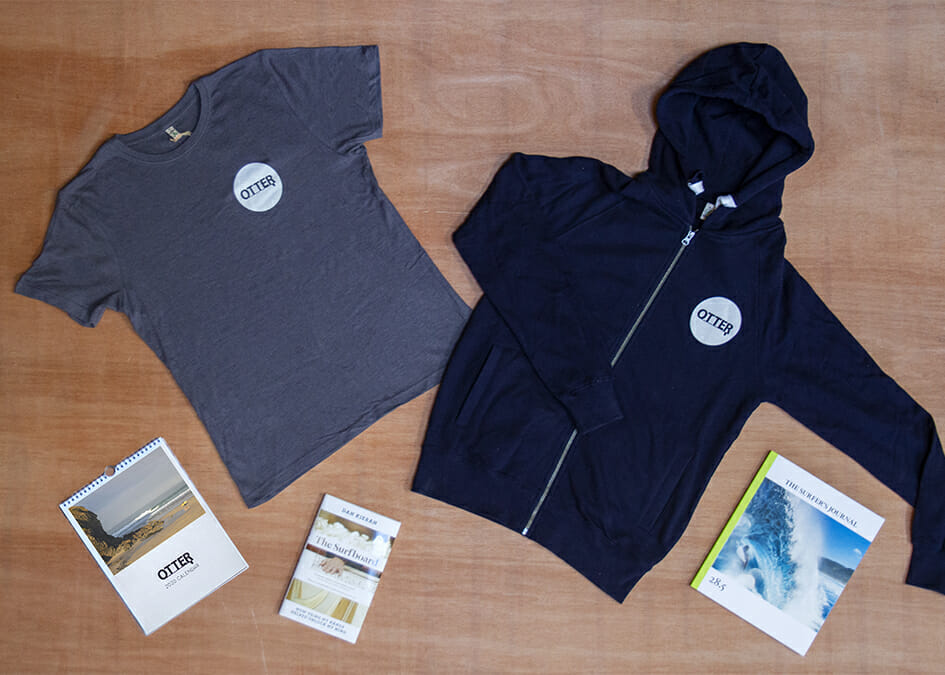 Otter surfboards Christmas bundle T-shirt and calendar surfers journal and surfboard book and hoody