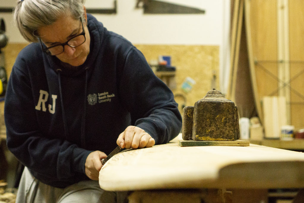 bodhi and James Otter buddy wooden surfboard workshop rasping rails