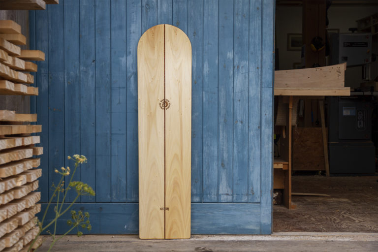 A collaborative bellyboard with surfers against sewage SAS wooden bellybord hand made in the otter workshop