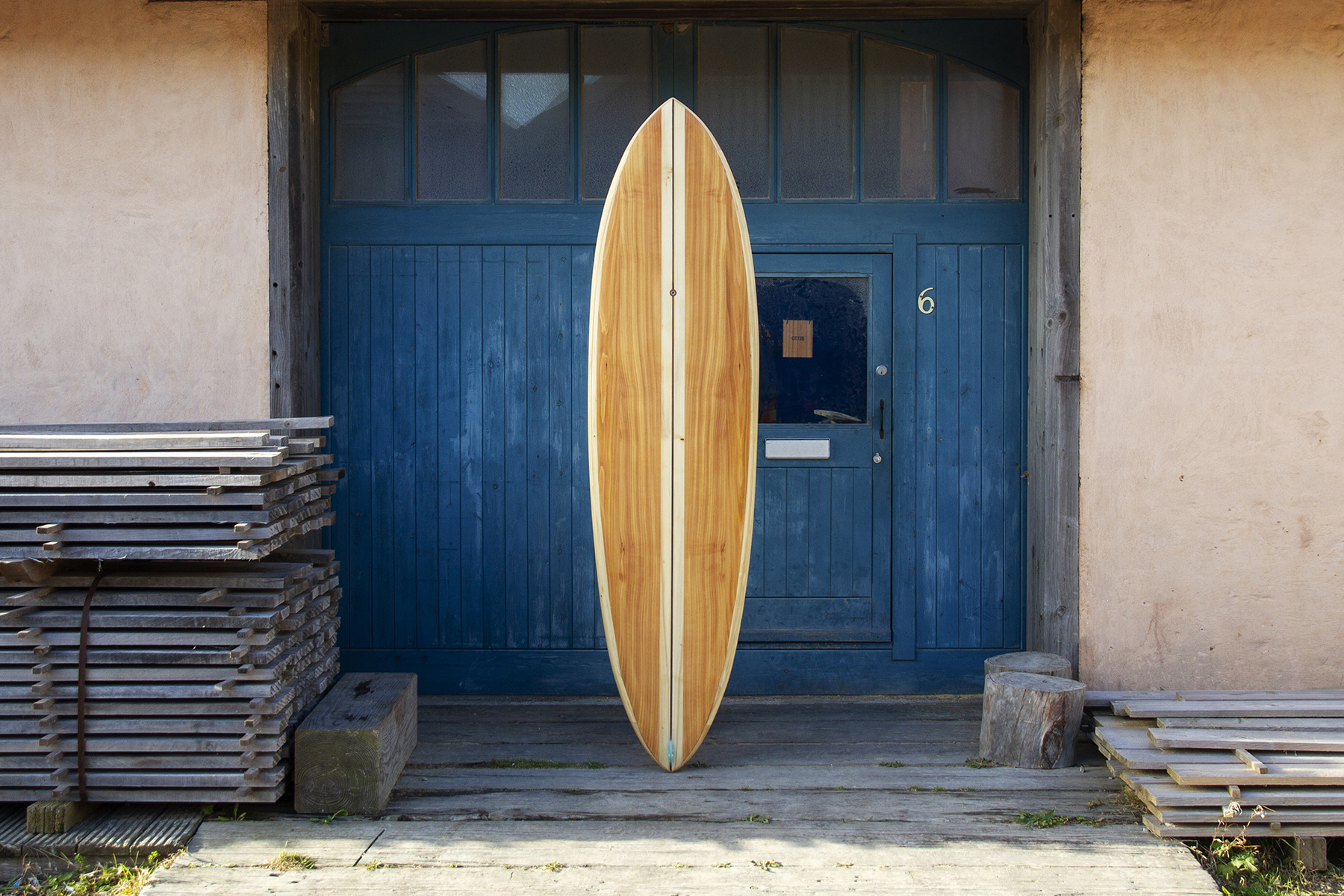 finished wooden surfboard composite otter surfboards workshop cornwall Roller Coaster