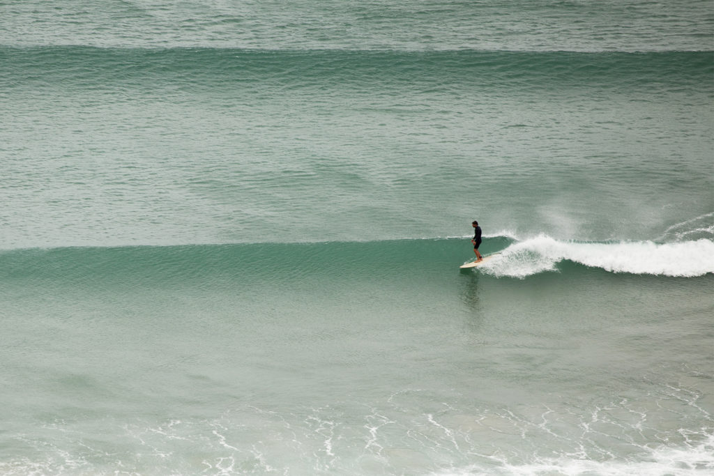 Marcus in trim on the Otter Surfboards Wooden Coaster at Chapel Porth, Cornwall.