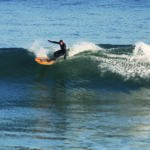 Chris top turns on the Otter Surfboards wooden Jetty at Gwithian, Cornwall