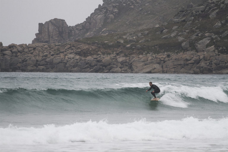 Sean lines up a fun wave at Gwenver Sennen, in Cornwall on his Jetty Otter Wooden surfboard.