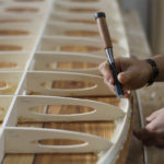 James Otter shaping wooden surfboard hand made handcrafted chisel workshop