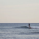 Sarah finding a lonely wave on the otter surfboards Pieces of Eight Wooden surfboard at Chapel Porth, Cornwall