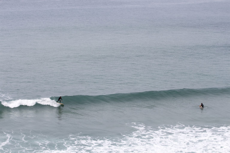 Chris and Tony surfing otter wooden surfboards in Cornwall. Jetty and Island Hopper.