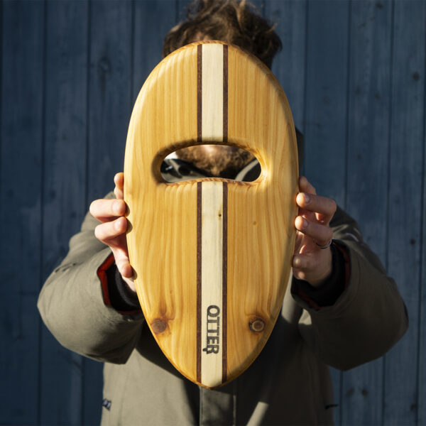 wooden bodysurfing handplane with sandwich layup pebble hand hole