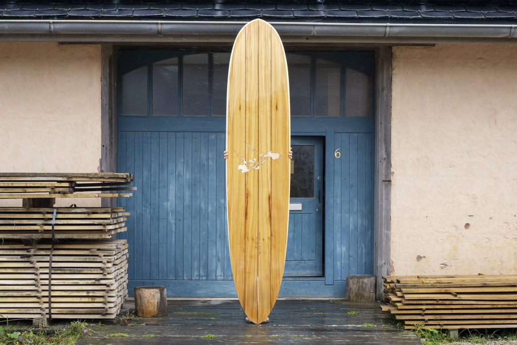 Wooden Longboard Custom Otter Surfboard with Map inlay of Philippines finished outside the workshop