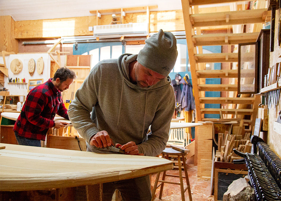 james Otter wooden surfboard workshop course cornwall with jonas shaping the nose