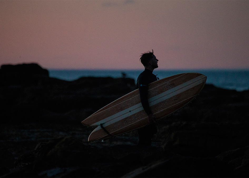 Lewis Arnold Sandy Kerr Easkey Britton Chris Noble Solstice Film Wooden Surfboards Scotland Hebrides Otter sandy standing in low light