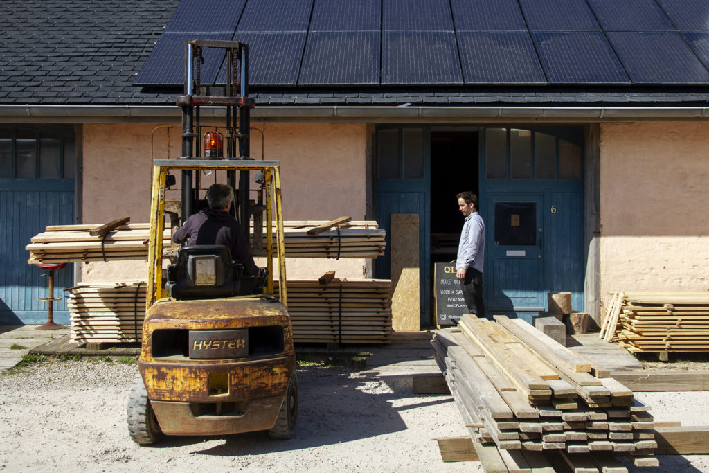 poplar and cedar wood outside the otter surfboards workshop
