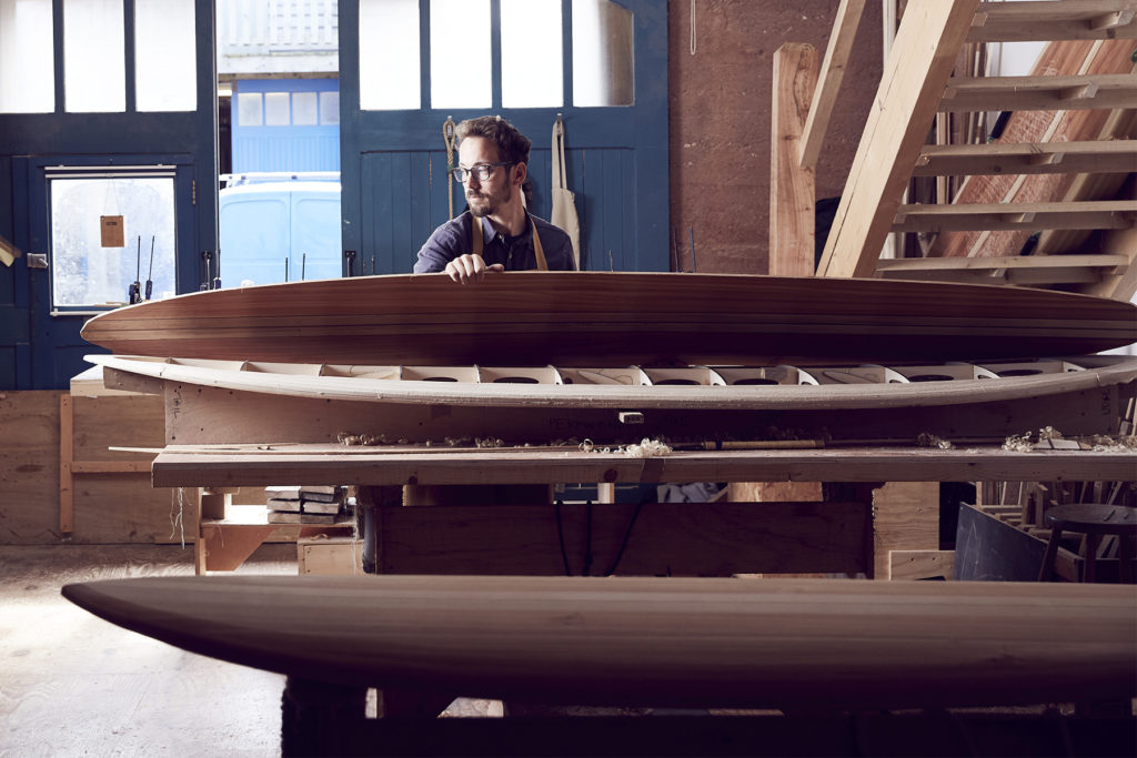 wooden surfboard construction in the otter workshop