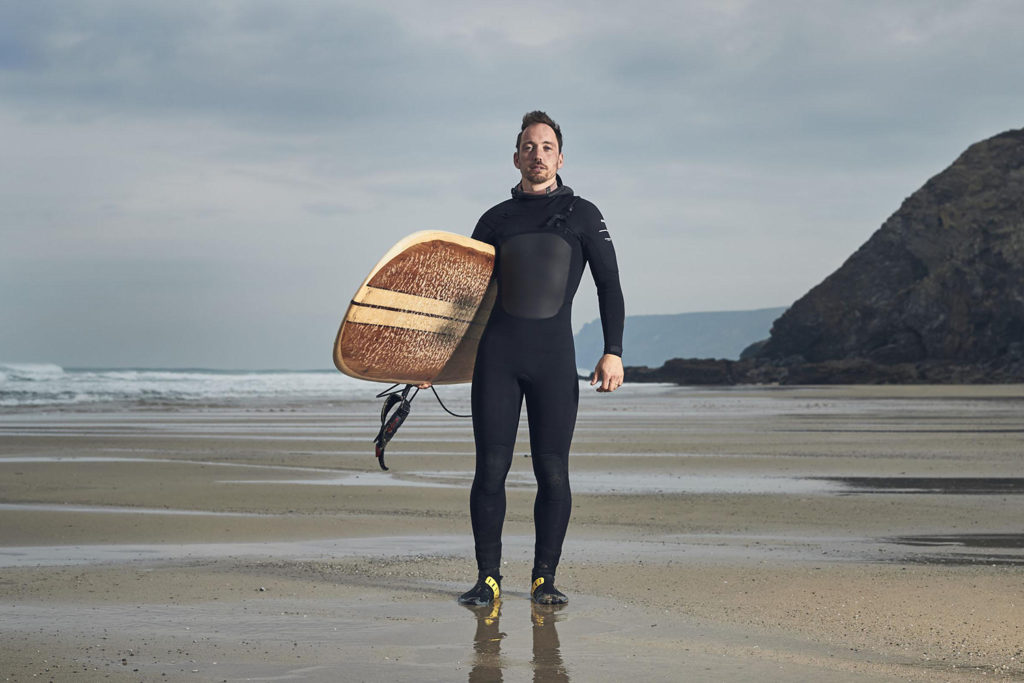 James Otter with his sustainable, hollow wooden surfboards, handcrafted in Cornwall, UK