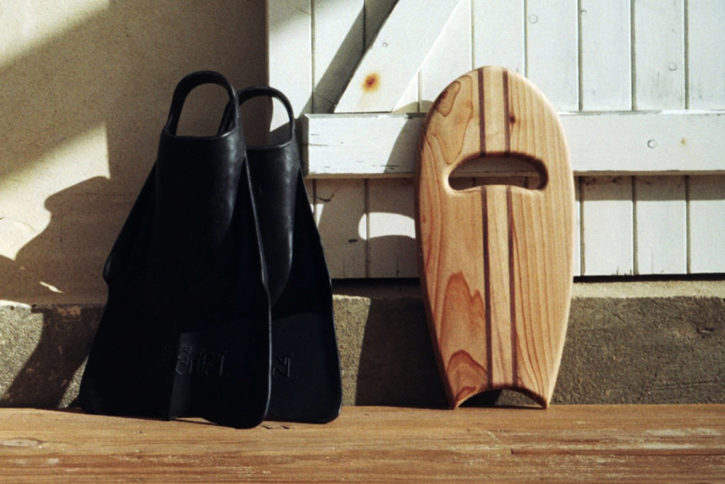 Otter Wooden bodysurfing Handplane and Da Fins product shot in france by Mat Arney close up