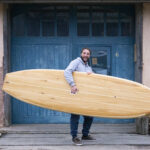 9-8 Otter Wooden Paddle Board SUP Drift Triple Pale - Ally holding