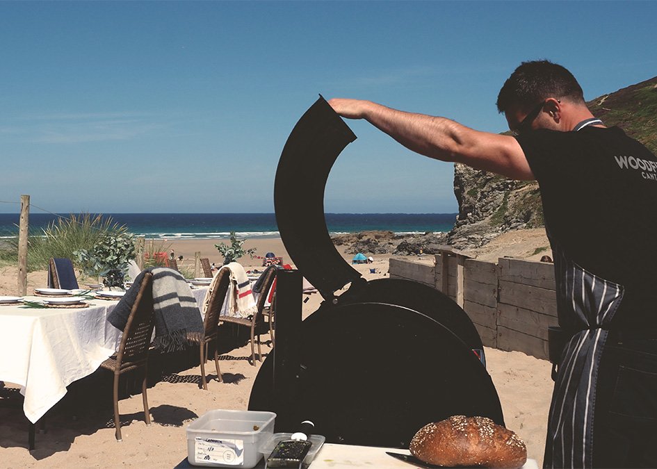 Wool Beach lodge otter surfboards wooden surfboard with wool fin woodfired canteen on the beach
