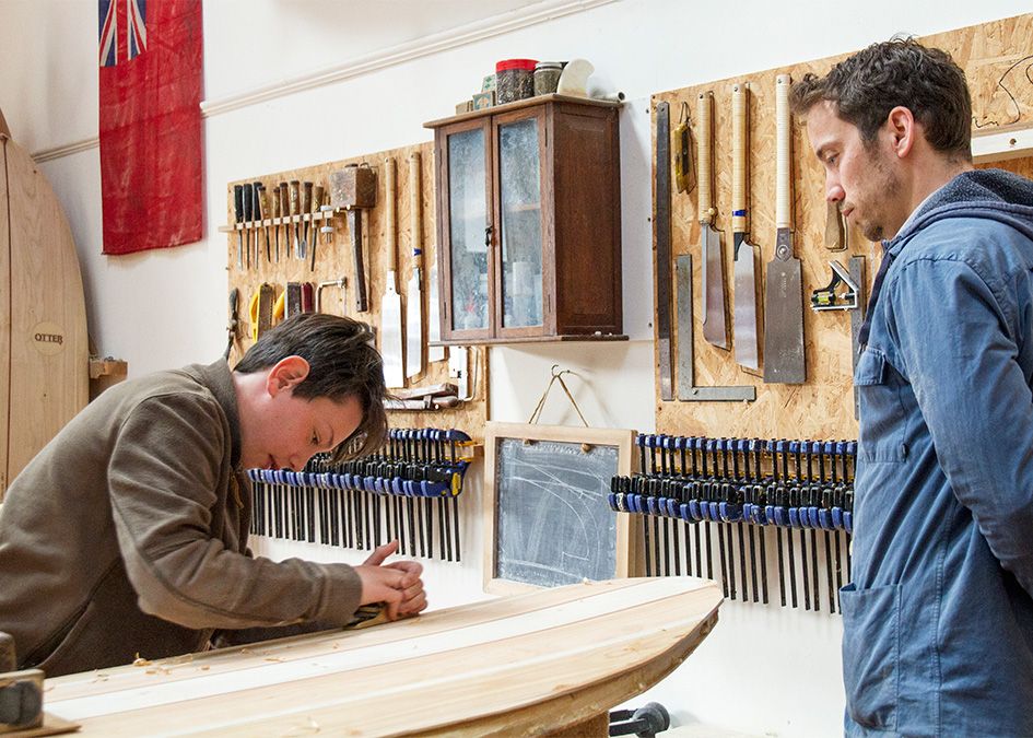 Otter wooden surfboard workshop shaping