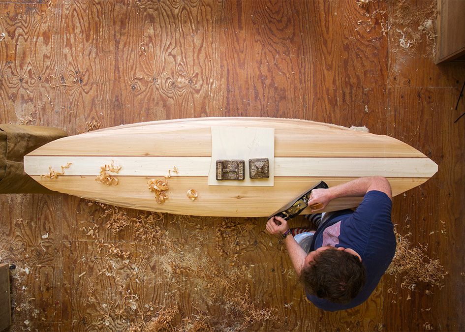 Otter wooden surfboard workshop shaping