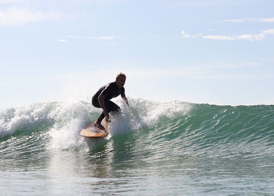 Otter wooden surfboard wave surfer
