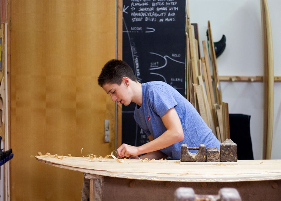 Otter wooden surfboard workshop shaping