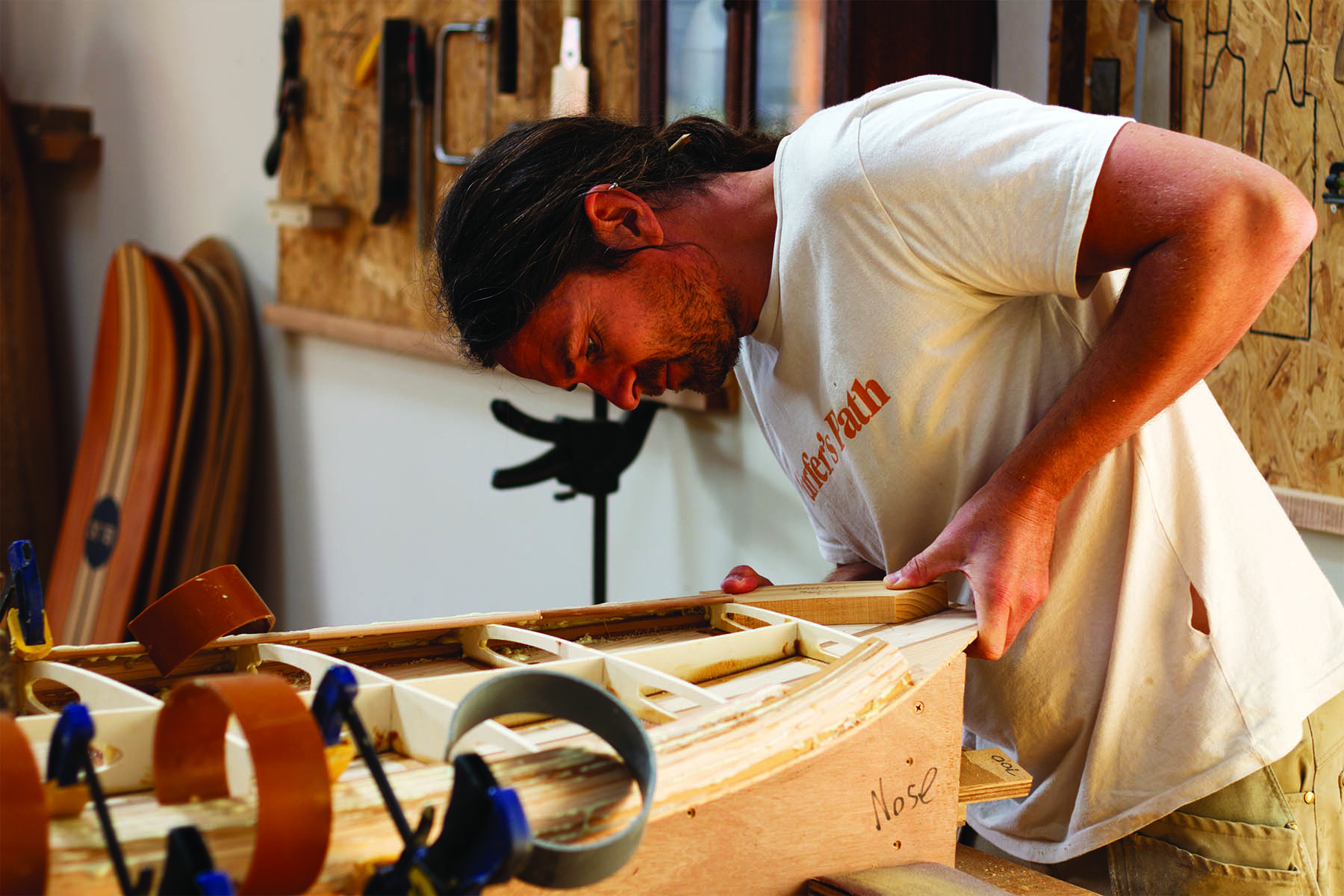 Tracy Martin and Paul Otter wooden surfboard workshop June 2014 paul checking nose block