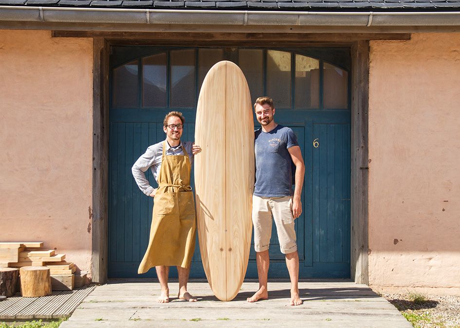 Otter wooden surfboard workshop blue doors