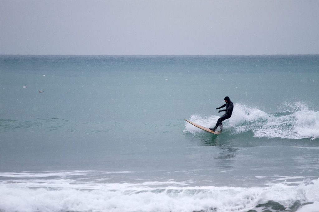 Otter wooden surfboard wave surfer